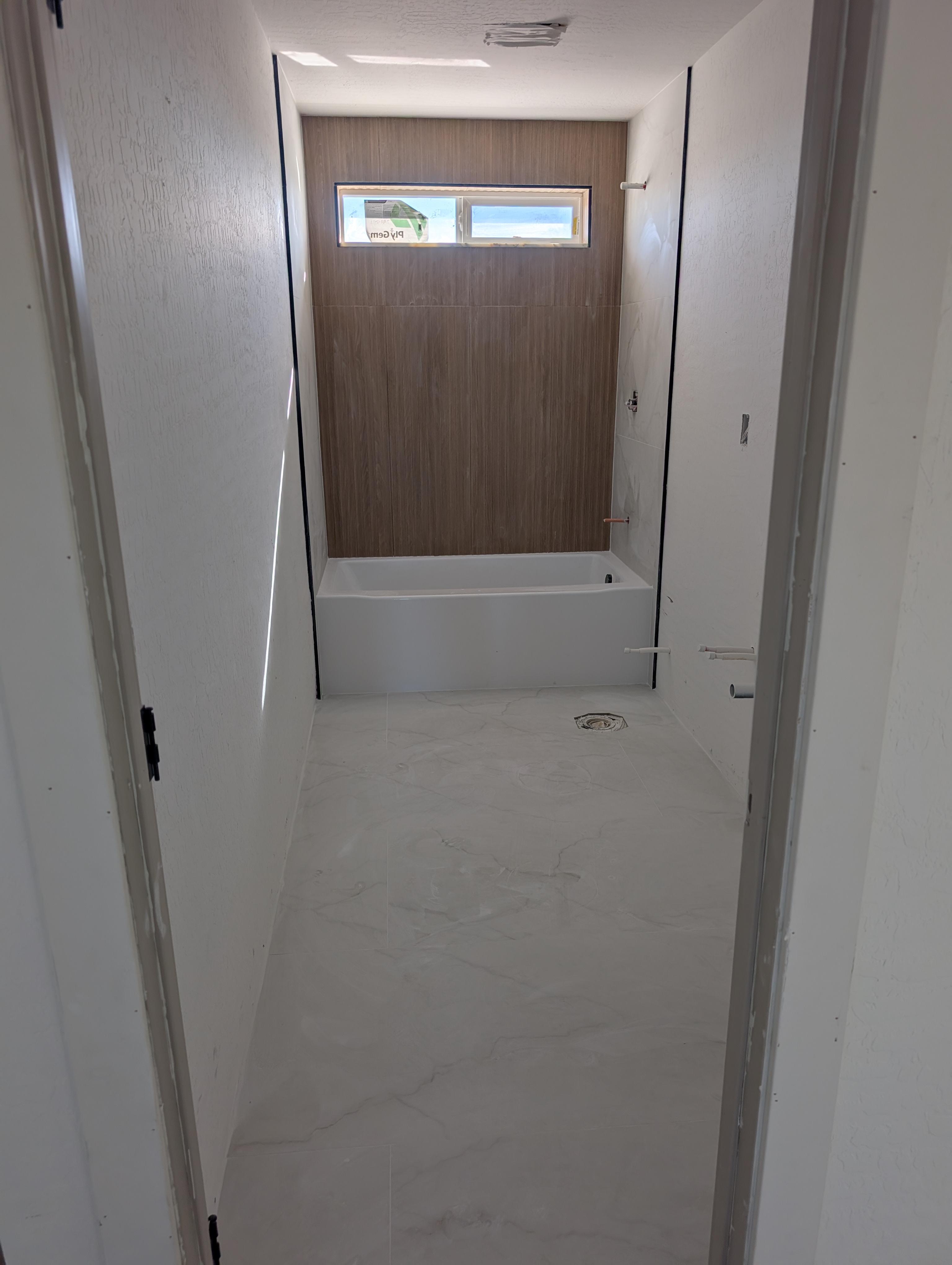 3721 Newcomb: Floors Down, Cabinets Next